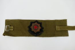 An armband bearing Coldstream Guards ins