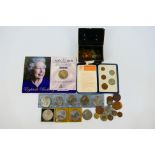 A collection of coins, commemorative cro