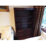 A carved oak bookcase, 152 cm (h) x 92 c