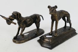 Two bronzed cast iron figures of dogs co