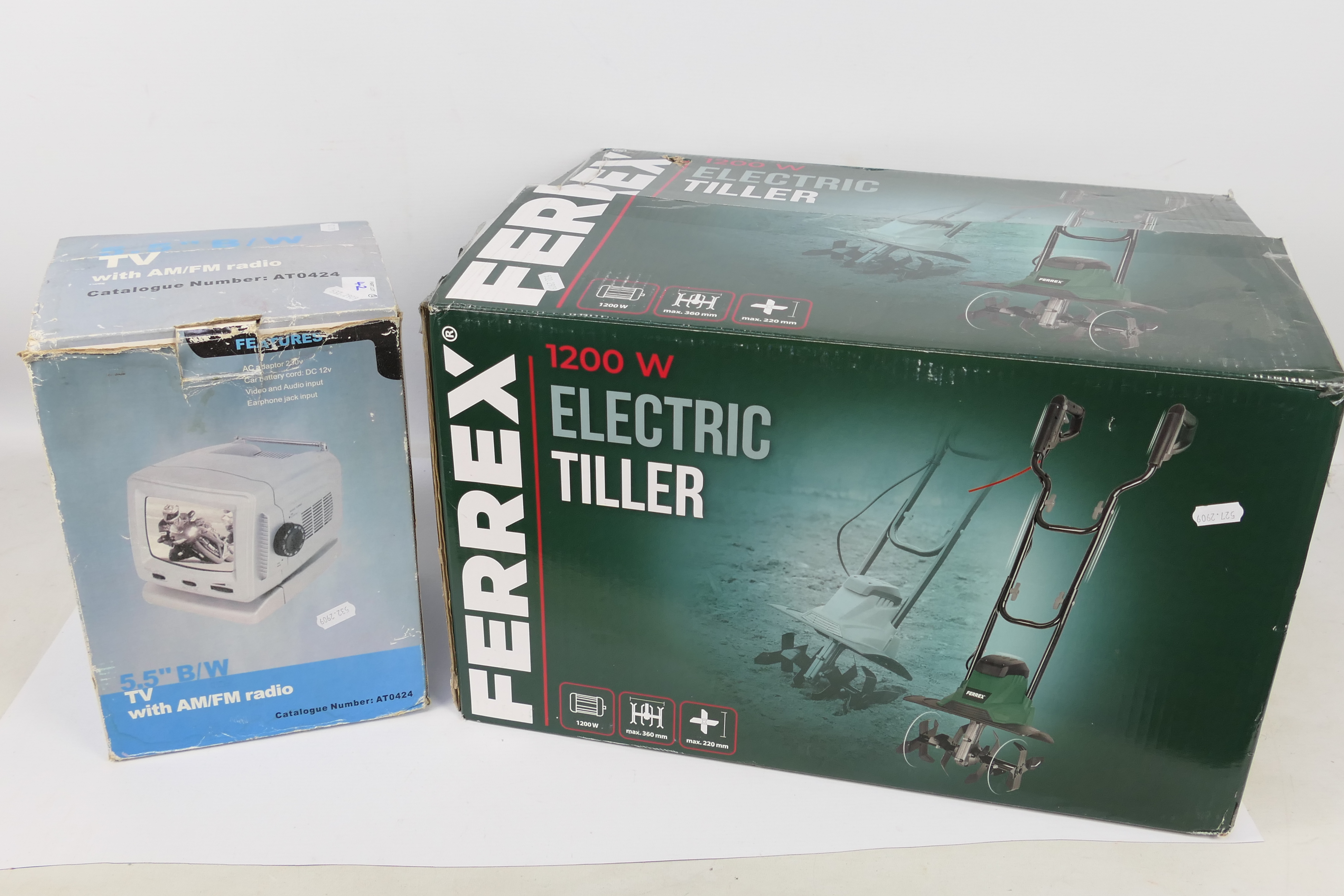 A Ferrex 1200 w Electric Tiller contained in original box appearing unused and a boxed portable