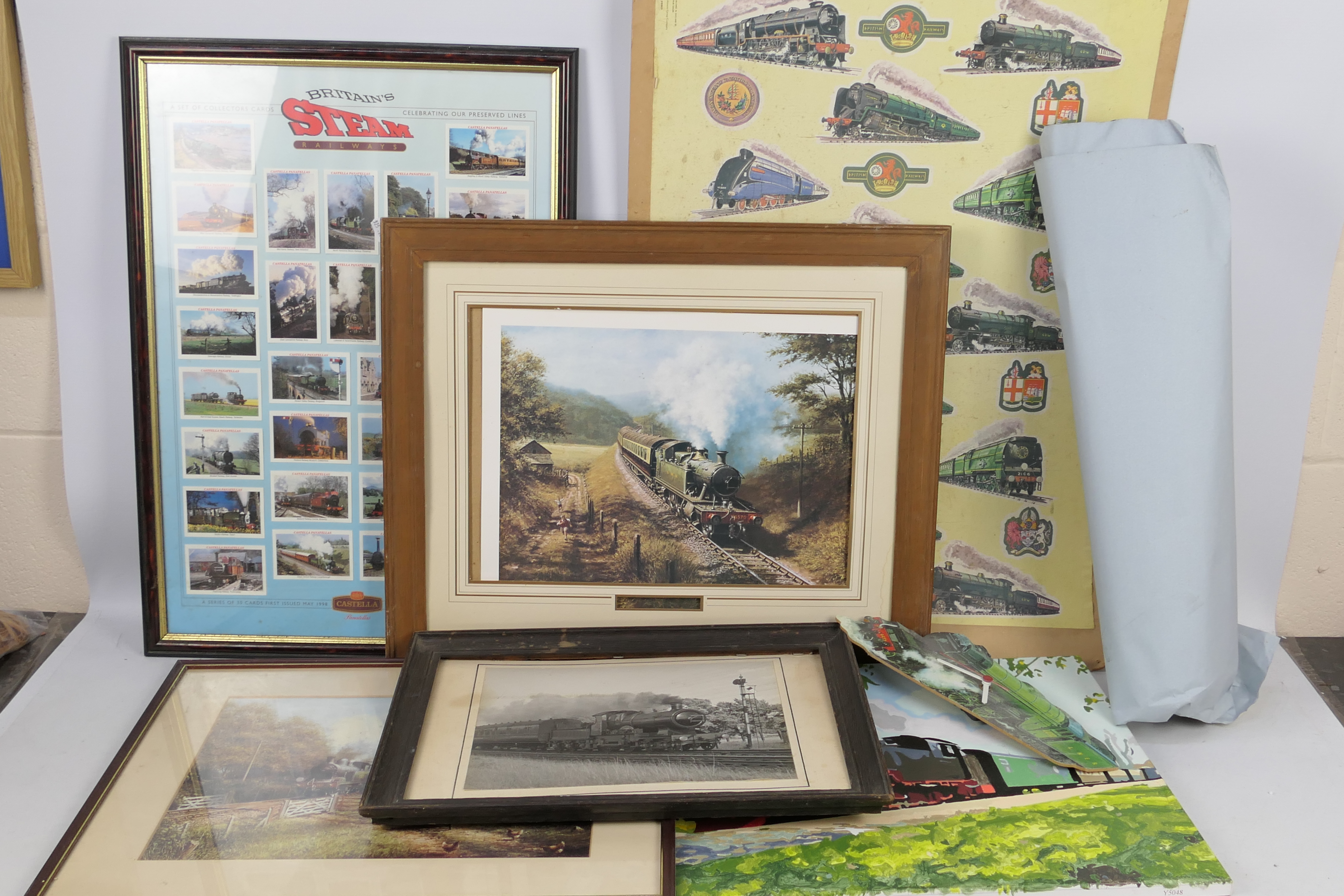 Railway related items to include posters, framed cigarette card display, wall clock,