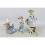 Three Spanish porcelain figures / groups by Lladro and Nao comprising Mirth In The Country # 4920,