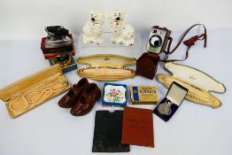 A mixed lot to include a pair of Beswick fireside dogs, a pair of tot's leather clogs,