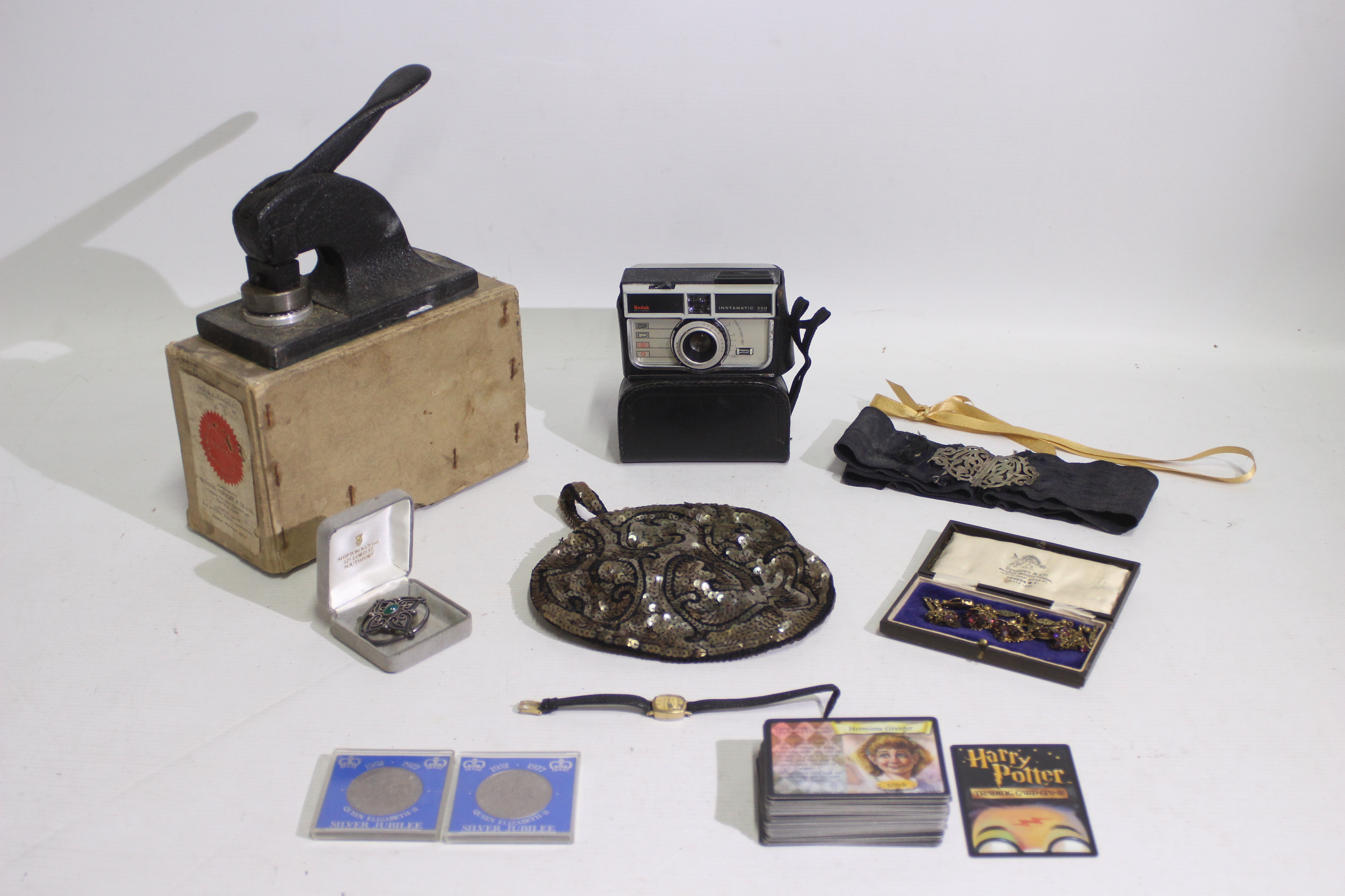 Lot to include costume jewellery, commemorative coins, Kodak camera,