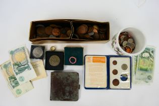 A quantity of coins including a Maria Th