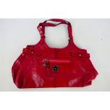 Mulberry - A cherry Mulberry leather handbag - Handbag has one interior zip pocket and one outer