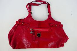 Mulberry - A cherry Mulberry leather handbag - Handbag has one interior zip pocket and one outer