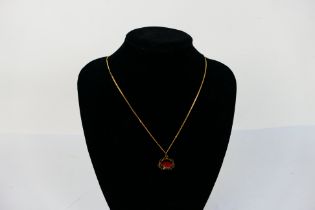 A 9ct yellow gold necklace, 50 cm (l), with 9ct gold swivel fob pendant, 5.4 grams.