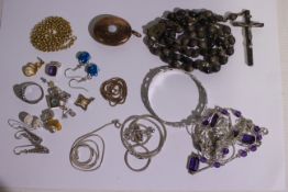 A small quantity of costume jewellery, necklaces, ring,