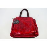 Meitrue - A dark red Meitrue leather handbag with shoulder strap - Handbag has one inner zip pocket,