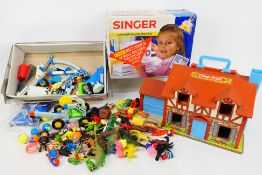 Singer - Fisher Price - A boxed Singer Lockstitch sewing machine,