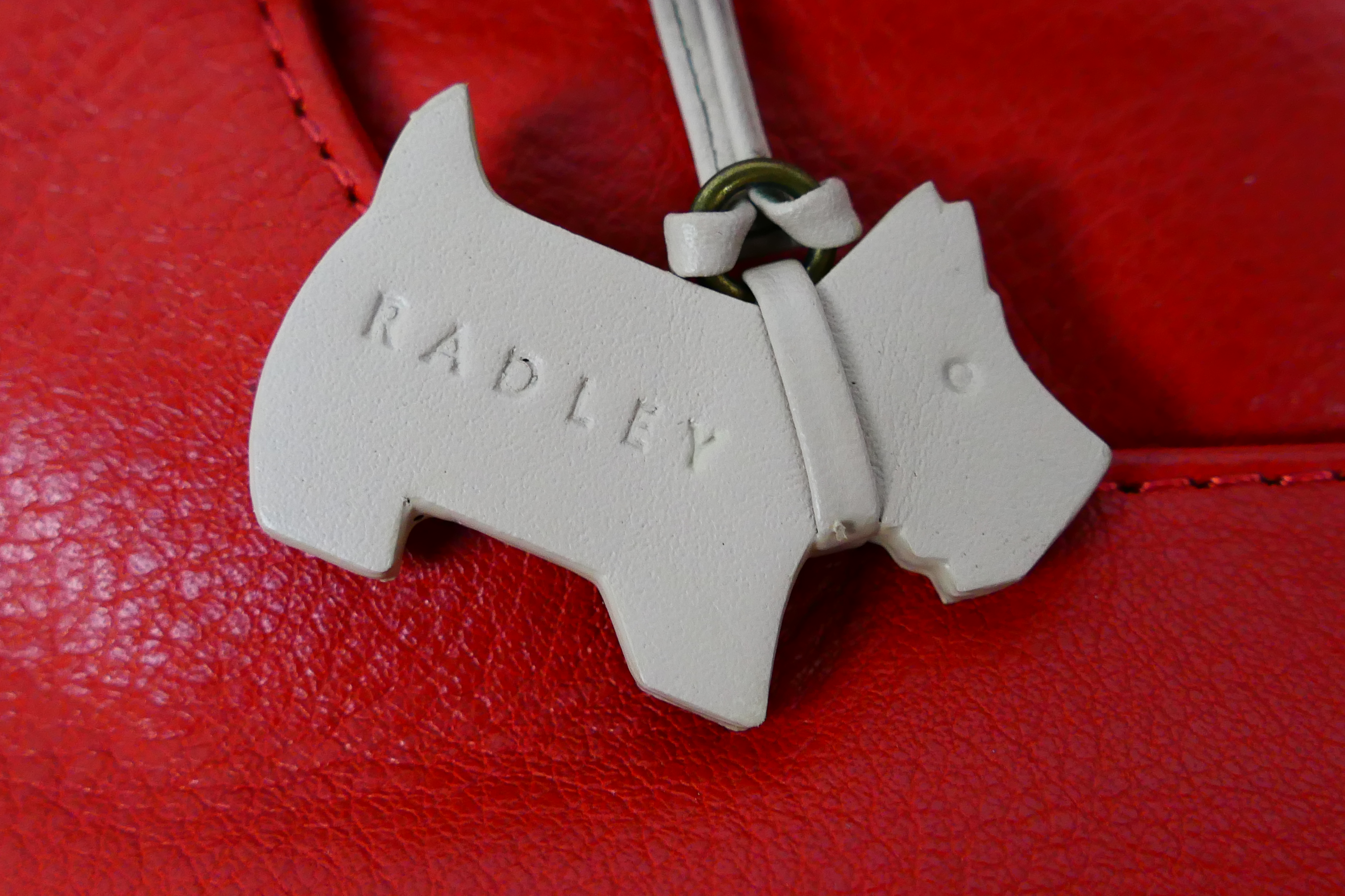 Radley - A limited edition Radley London orange leather handbag - Handbag has one interior zip - Image 5 of 7