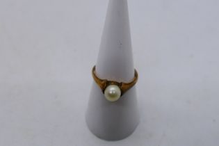 A 9ct rose gold pearl solitaire ring, size O, 2.7 grams.