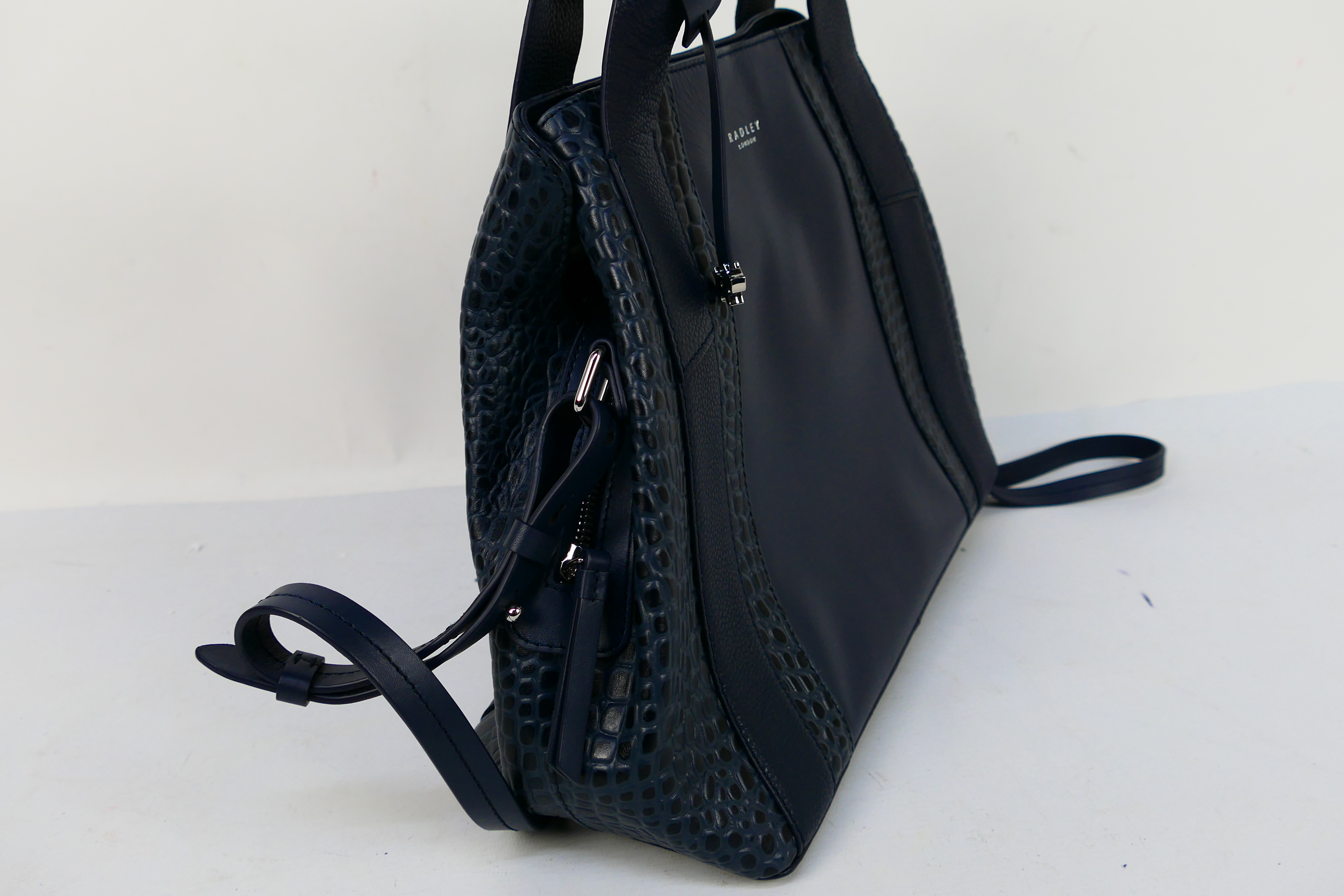 Radley - A dark blue Radley London leather handbag - Handbag has two interior zip pockets, - Image 5 of 8