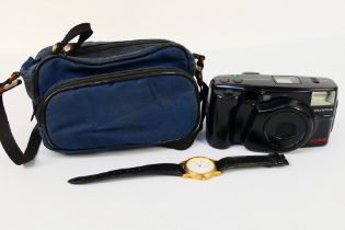 An Olympus Zoom AF camera and a Sekonda wrist watch.