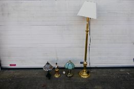 A brass standard lamp,