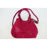 Mabel - A dark pink/purple Mabel London leather hand bag with shoulder strap - Handbag has one