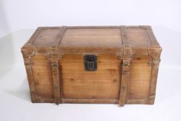A wooden chest. Chest is 60 cm (l) x 28 cm (w) x 30 cm (h).