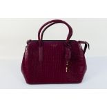 Radley London - A leather Radley handbag in dark purple colour - Comes with inner Radley pink bag