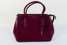 Radley London - A leather Radley handbag in dark purple colour - Comes with inner Radley pink bag