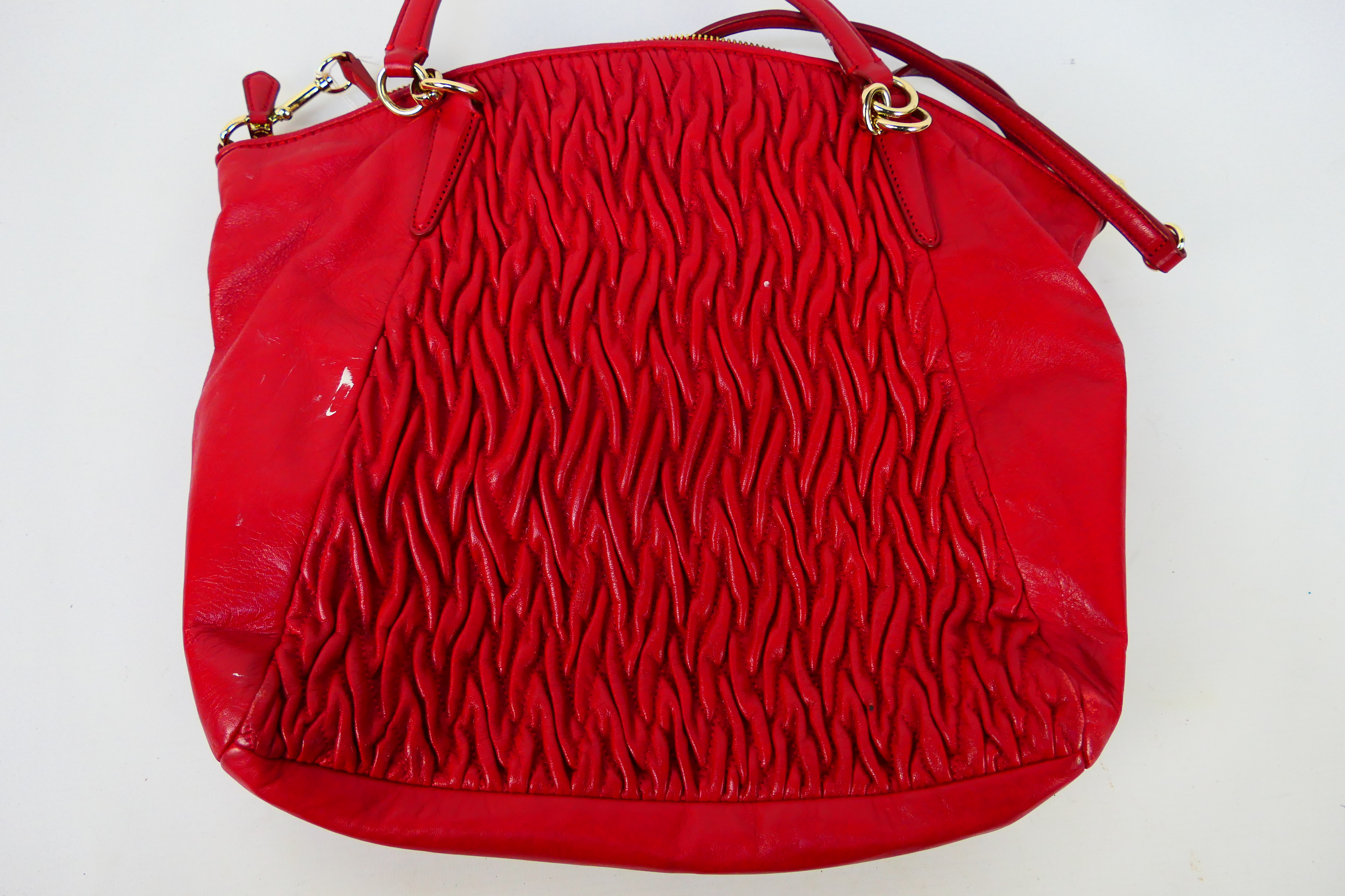 Coach New York - a Red Coach handbag, labelled with makers mark, with shoulder strap, - Image 4 of 7