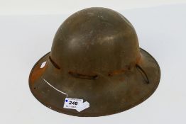 A World War Two (WW2 / WWII) Zuckerman Civil Defence helmet.