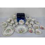 A collection of various Aynsley pieces to include trinket dishes, vases and other.