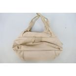 Radley - A white Radley London leather handbag - Handbag has two interior zip pockets,