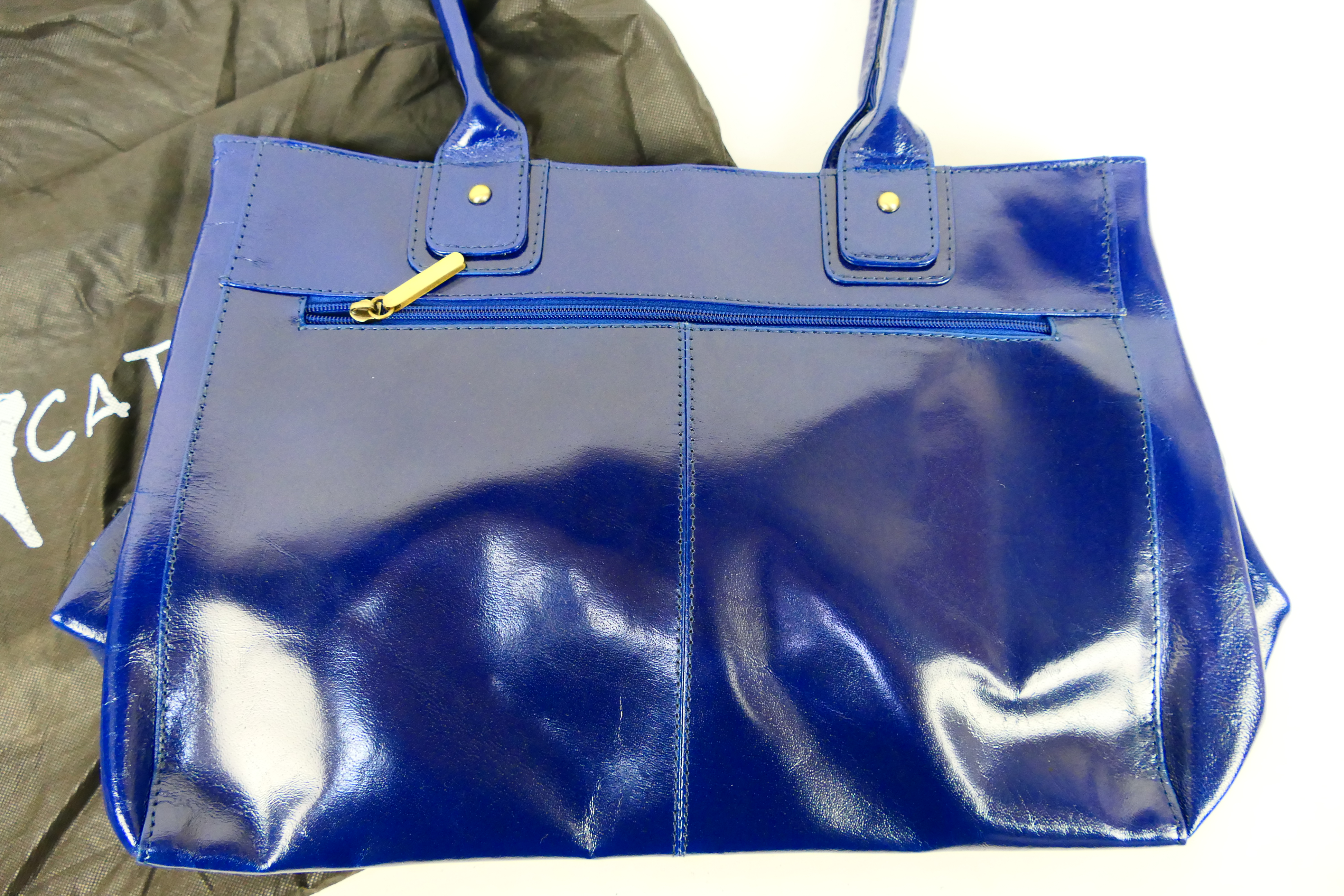 Catwalk Collection - A Catwalk Collection dark blue leather handbag - Handbag has two inside zip - Image 2 of 5