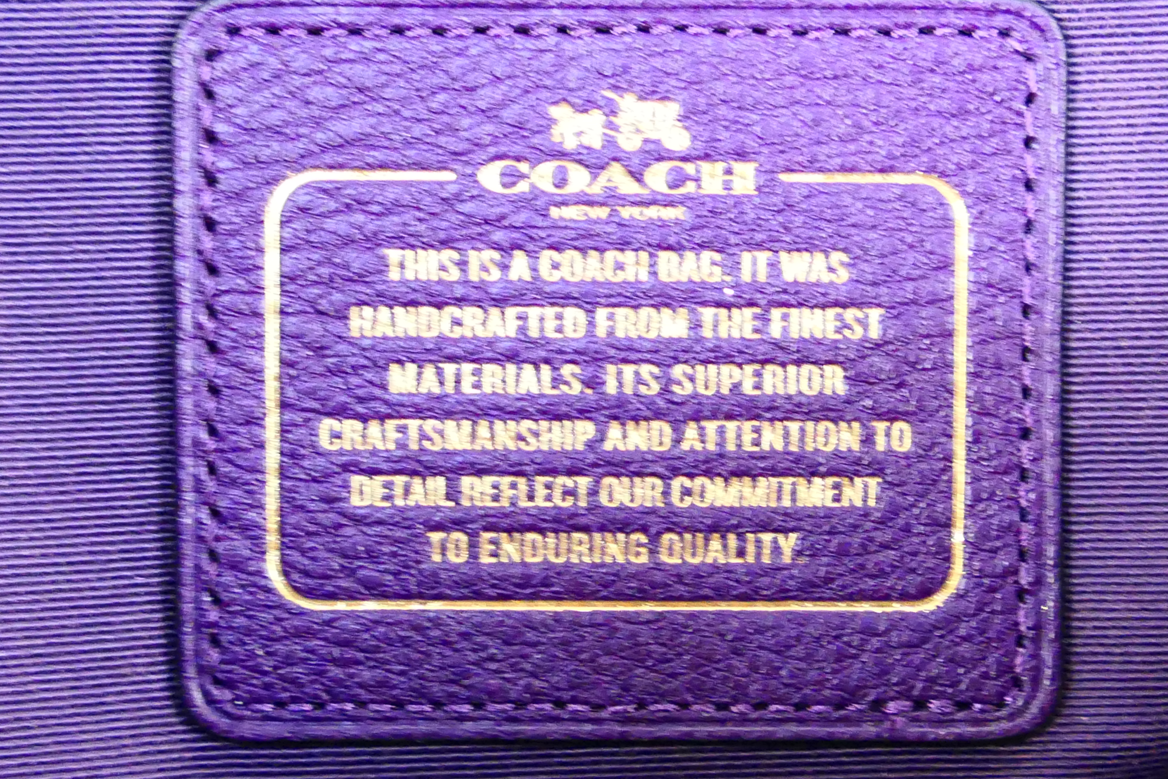 Coach New York - a Purple Coach handbag, labelled with makers mark, with shoulder strap, - Image 6 of 6