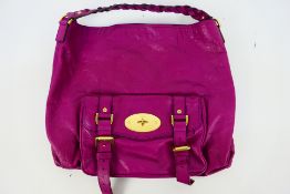 Mulberry - A dark pink Mulberry leather handbag - Handbag has one interior zip pocket, one pouch,