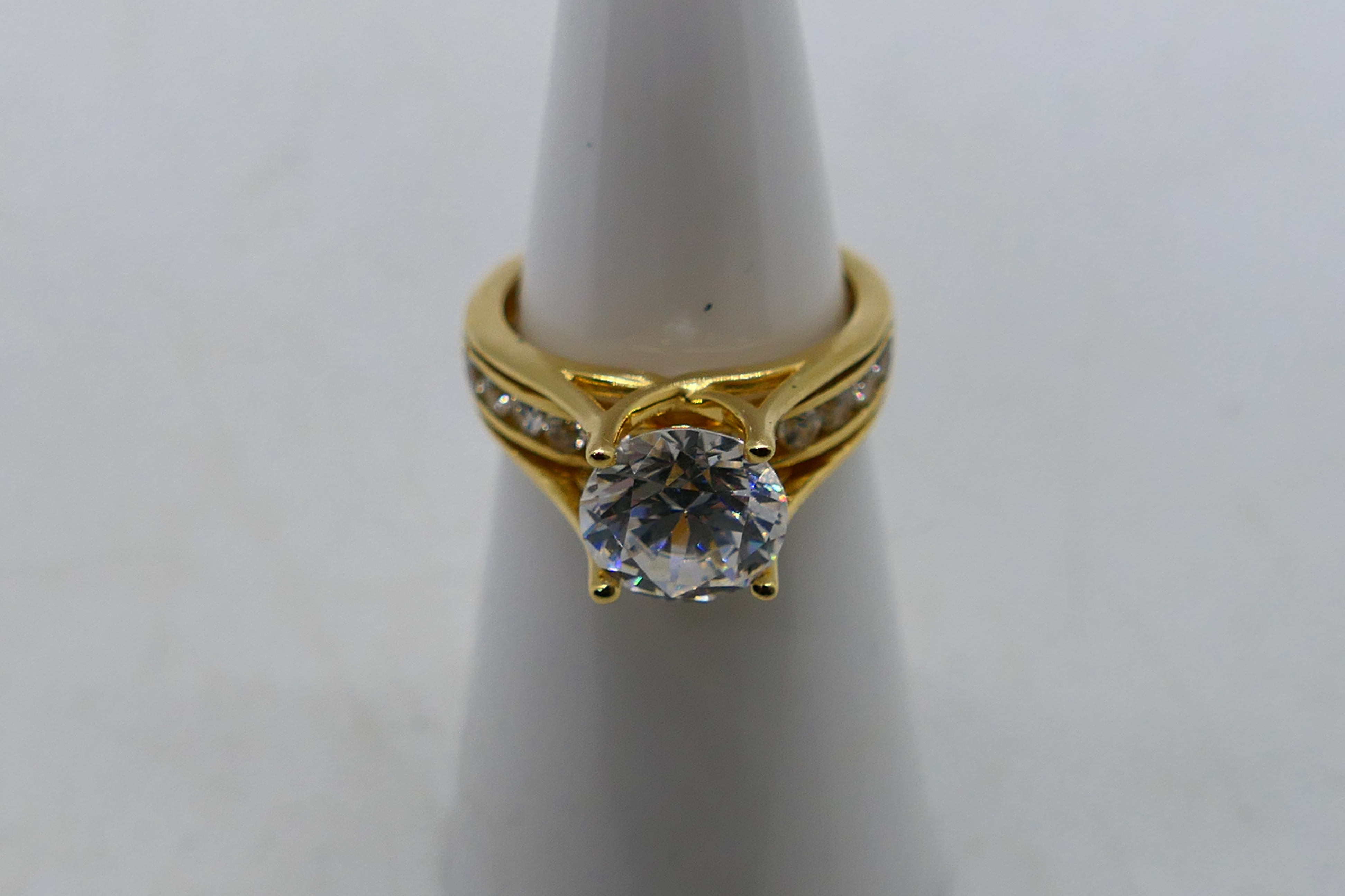 A 14ct yellow gold CZ set ring, size H+½, 3.5 grams all in. - Image 4 of 6