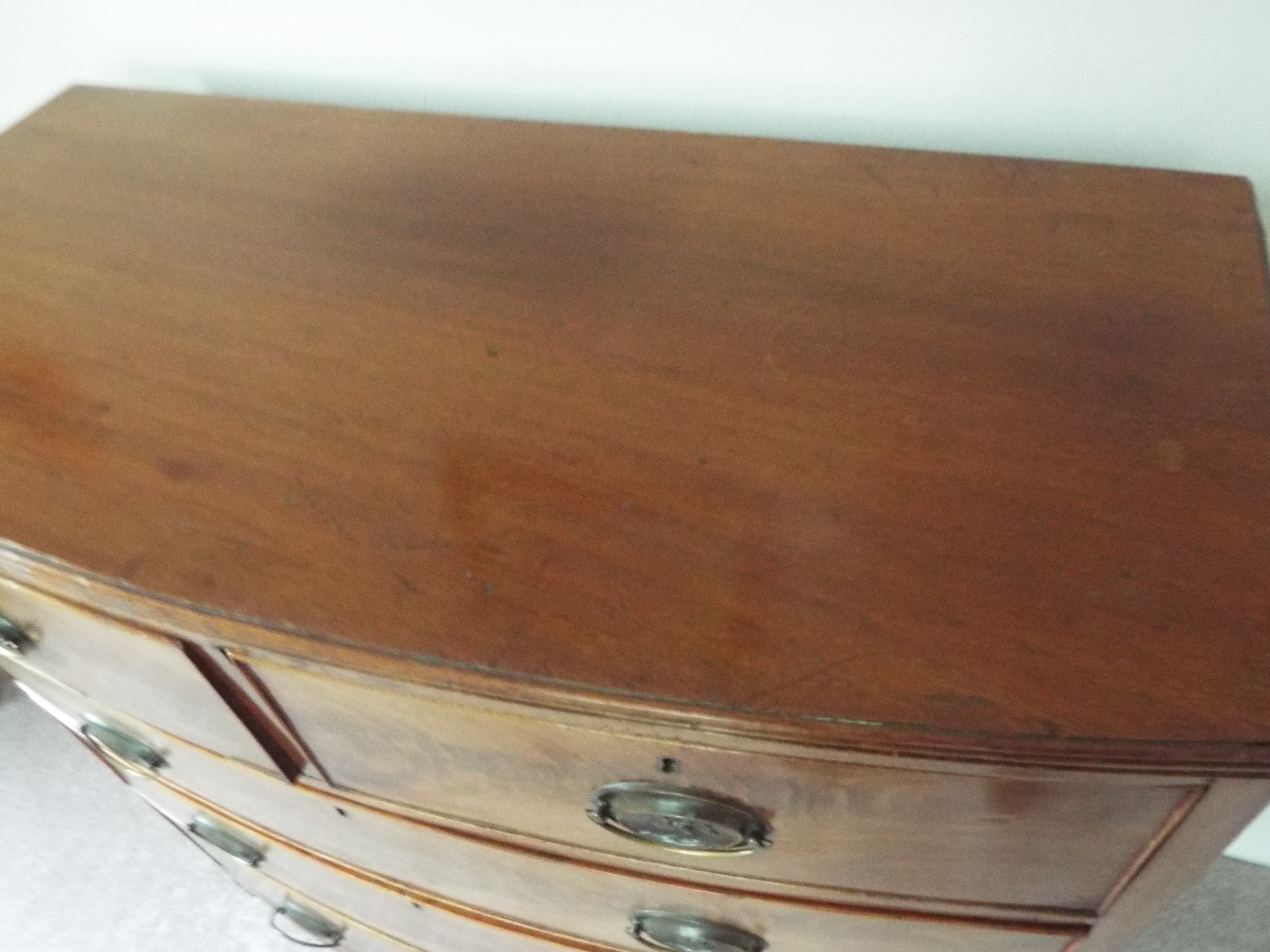 A Victorian bow fronted chest of two over three drawers with brass drop handles, - Image 4 of 4