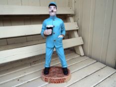 Guinness - a promotional figure depicting a Zoo Keeper dressed in a blue uniform holding a pint and
