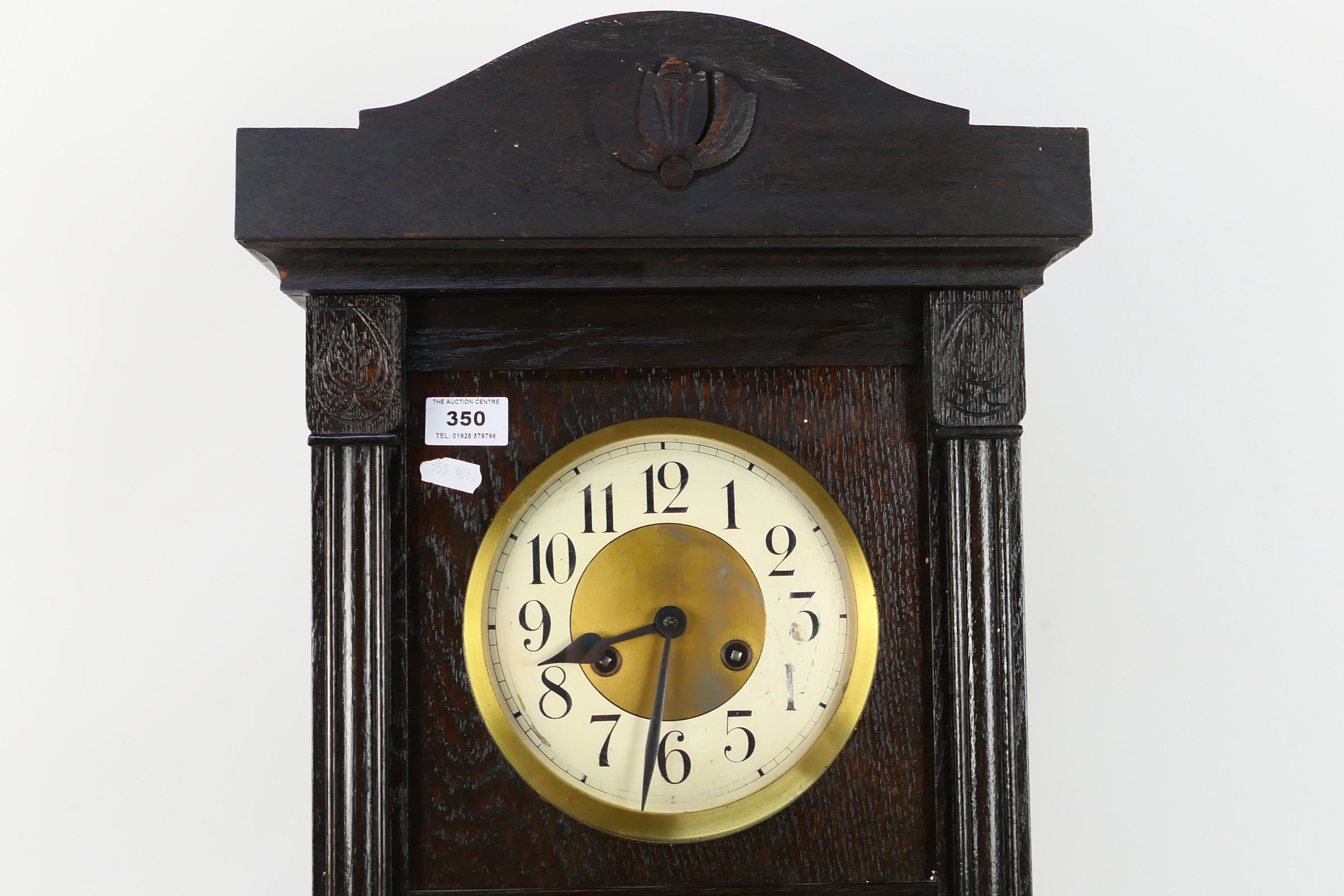 A dark brown wall clock. Wall clock is marked Glocken-Gong. Wall clock comes with key and pendulum. - Image 2 of 5