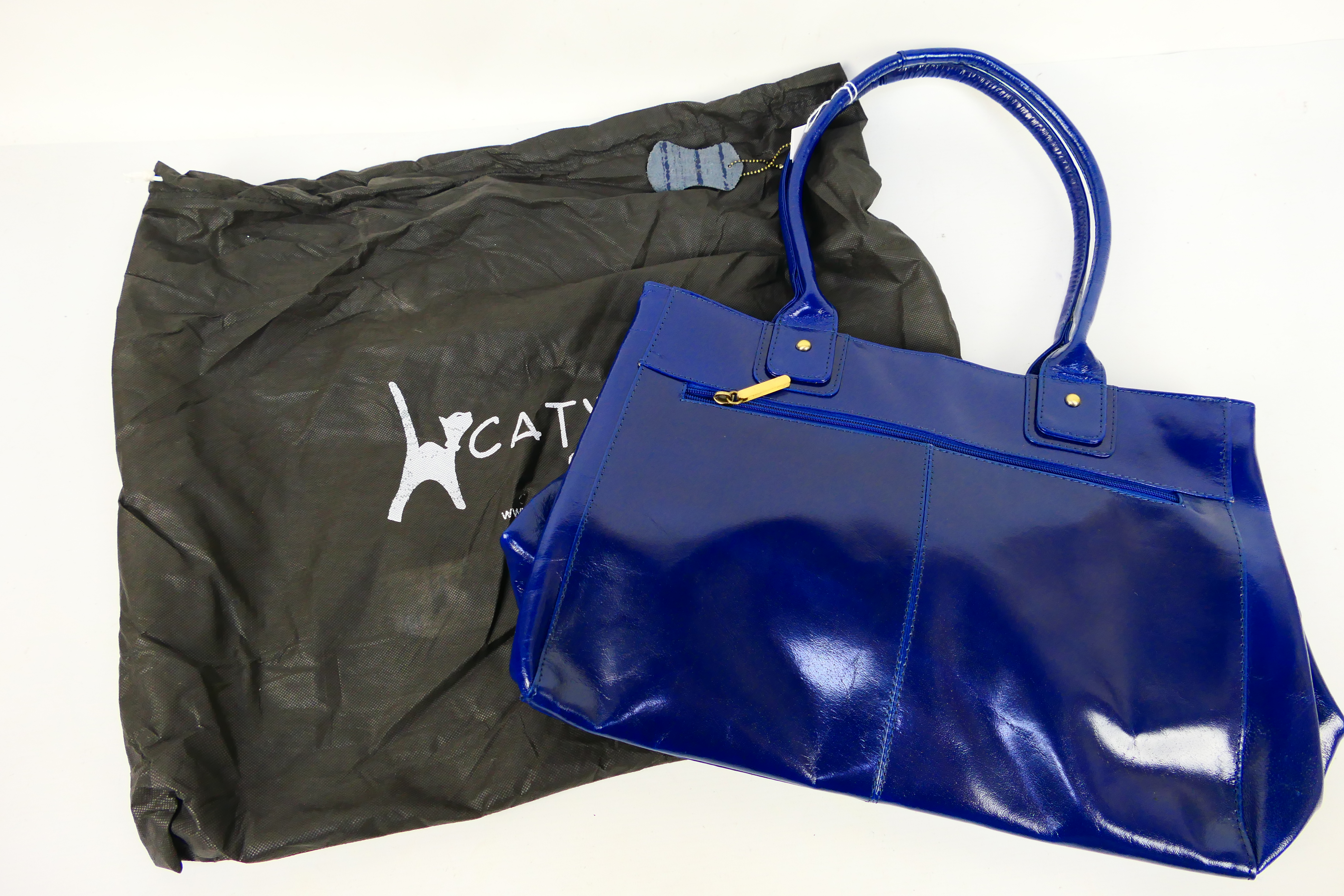 Catwalk Collection - A Catwalk Collection dark blue leather handbag - Handbag has two inside zip