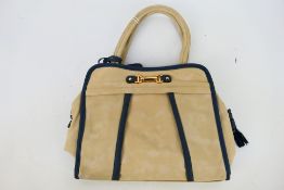 Rieker - A Rieker cream leather handbag with shoulder strap - Handbag has one inside zip pocket,