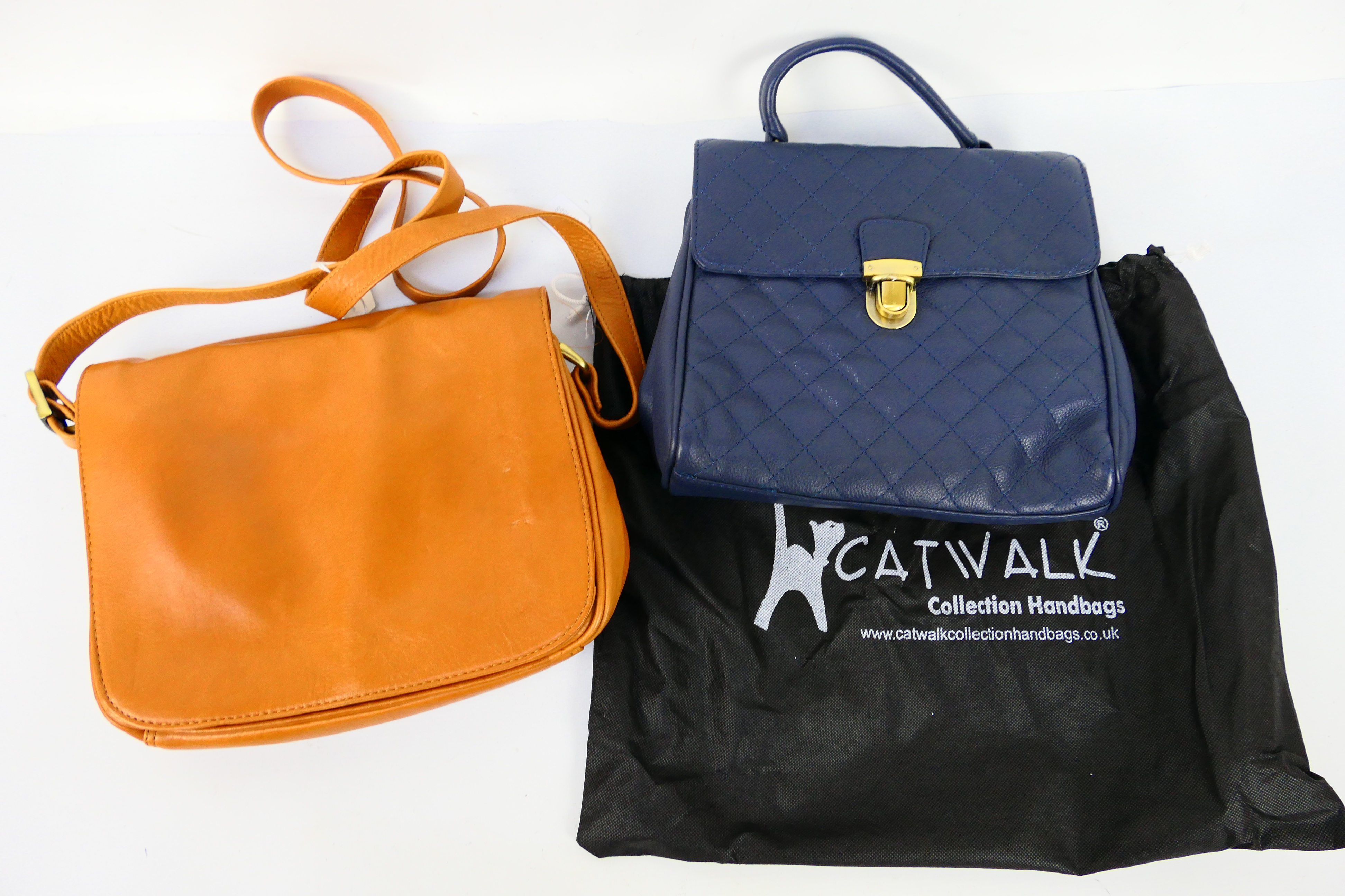 Catwalk Collection - Jobis - a Navy Blue Catwalk handbag, labelled with makers mark,