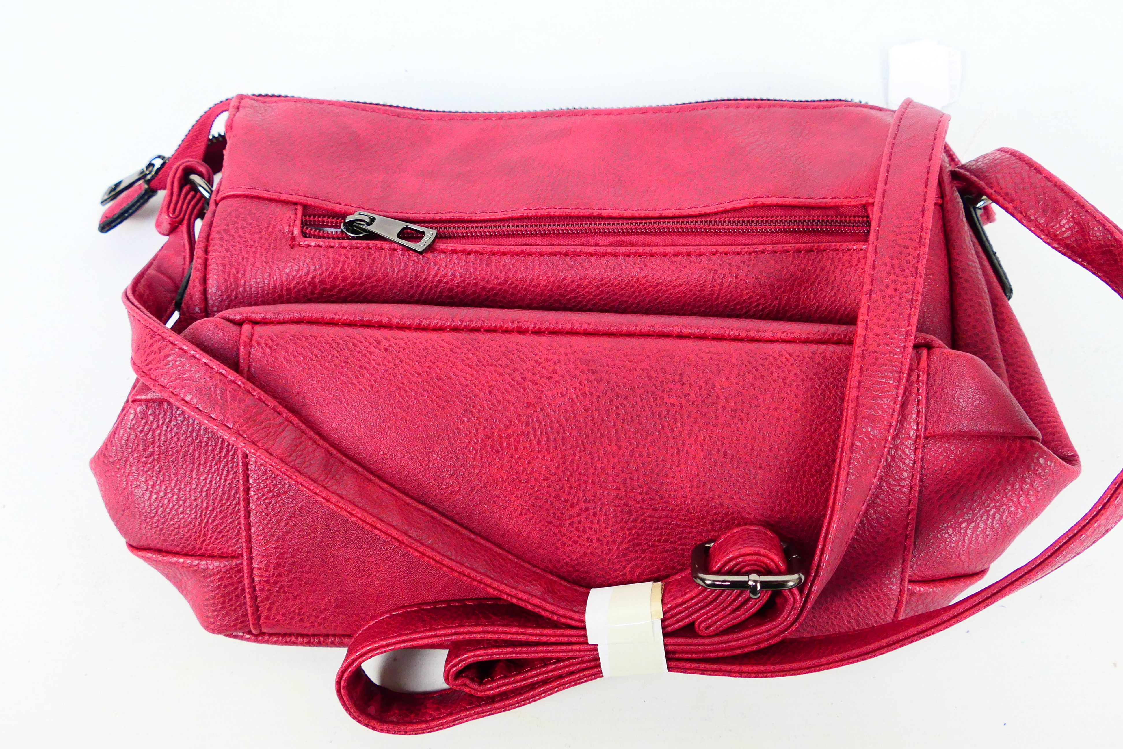 Lulu - A dark red Lulu leather handbag with shoulder strap - Handbag has four inner pouches, - Image 6 of 6