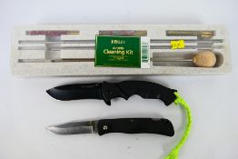 Two folding knives comprising a Boker Magnum and a Smith & Wesson and a Bisley air rifle cleaning
