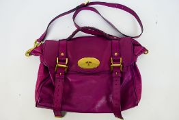 Mulberry - A raspberry Mulberry leather handbag - Handbag has one interior zip pocket and one pouch.
