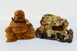 A soapstone carving and carved wooden Budai, largest 14 cm (h). [2].