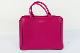 Fiorelli - A pink Fiorelli leather handbag - Handbag has two inner zip pockets and pouches.