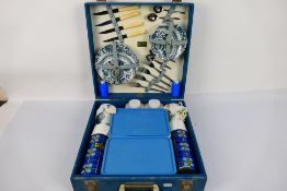 A Brexton vintage picnic set contained in fitted case.