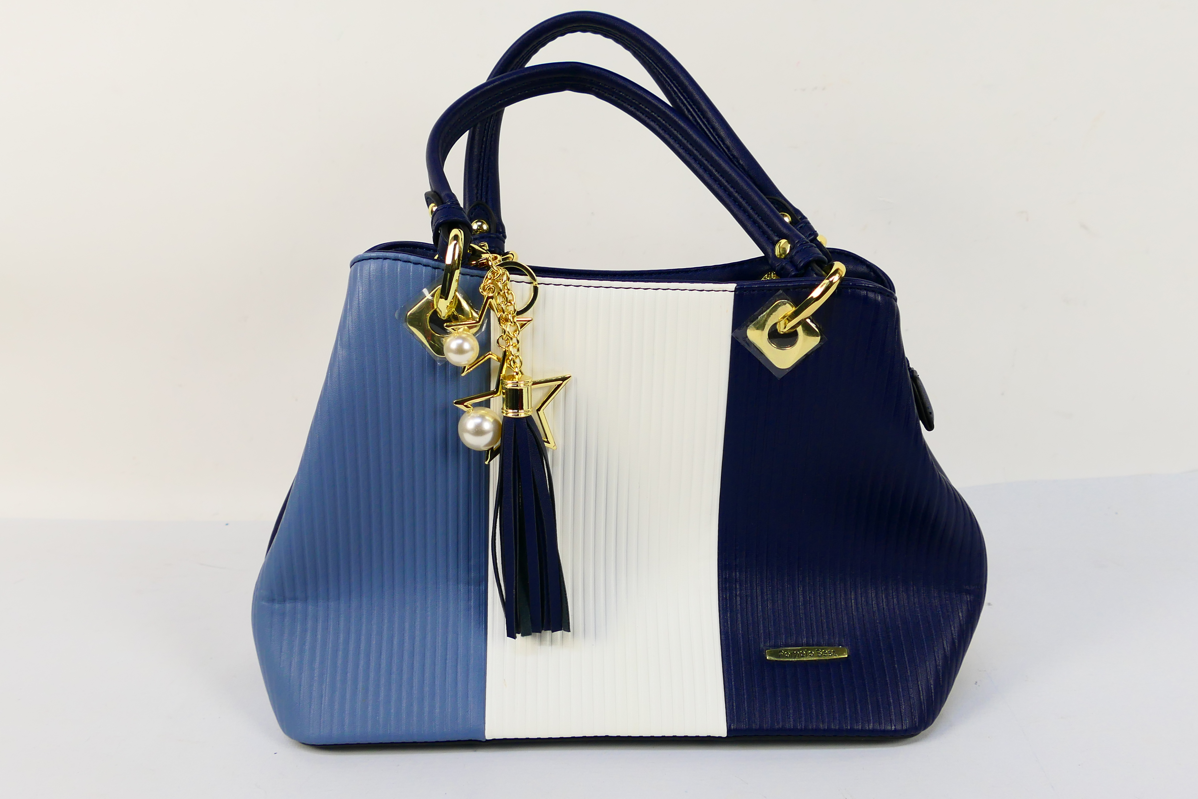Pomelo Best - A Pomelo Best handbag in tones of blue and white.