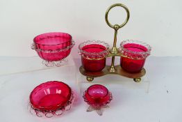 Cranberry Glass - a pair of cranberry glass dishes with clear glass frilled decorated to the upper