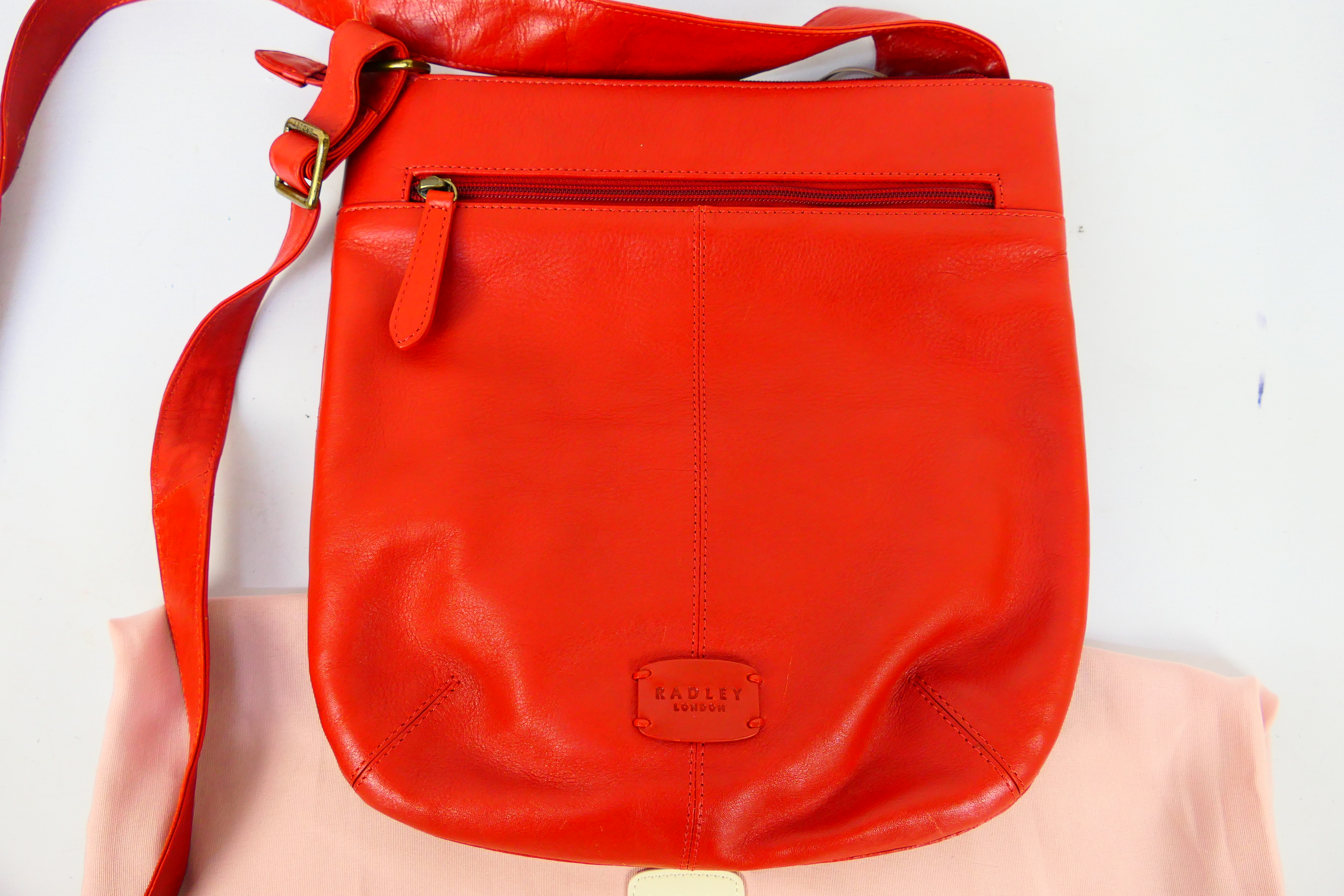 Radley - A limited edition Radley London orange leather handbag - Handbag has one interior zip - Image 2 of 7