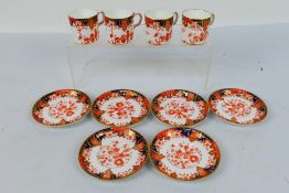 Royal Crown Derby - four coffee cans and six saucers decorated in the Imari palette, # 2712,