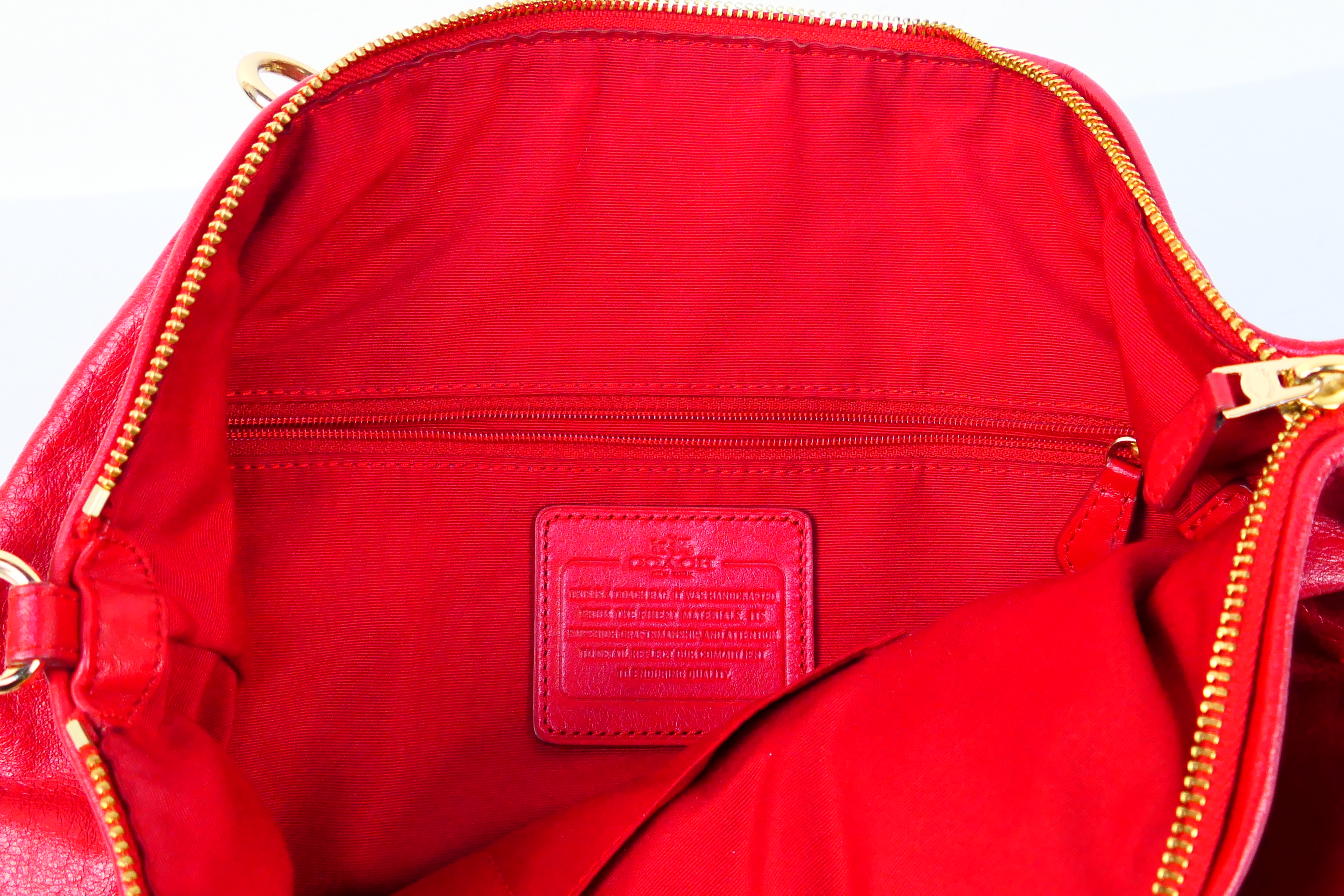 Coach New York - a Red Coach handbag, labelled with makers mark, with shoulder strap, - Image 6 of 7